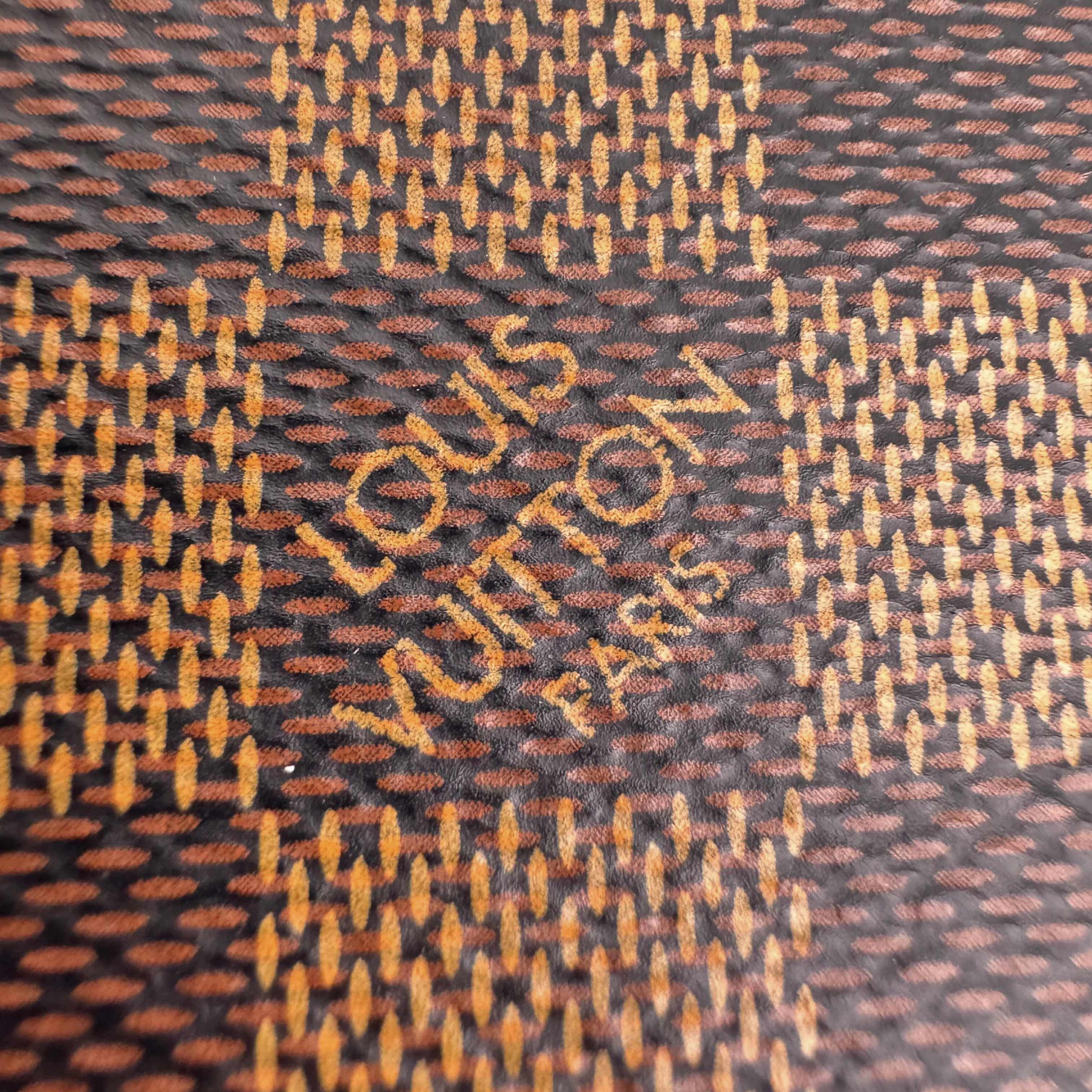 Louis Vuitton Clémence Canvas Wallet
