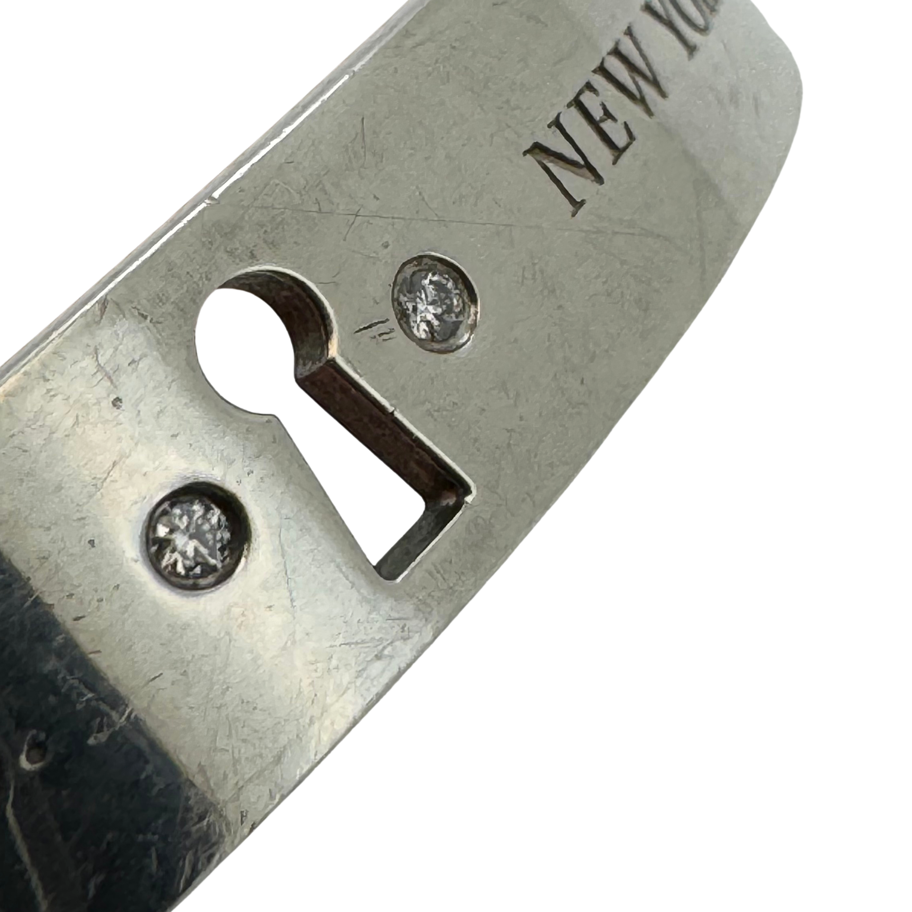 Tiffany & Co Diamond Lock Narrow Bangle Silver .04 TDW - Lost Designer