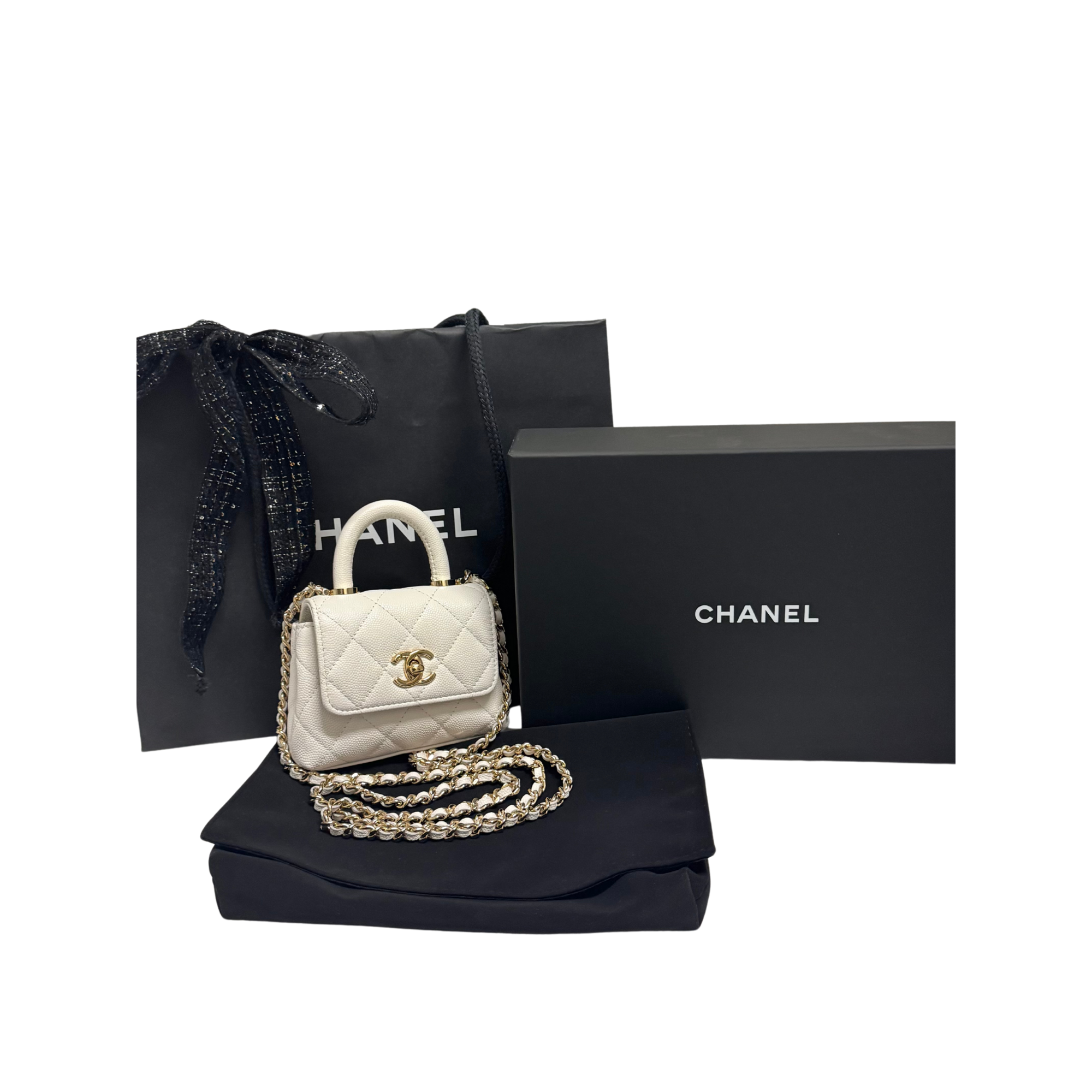 Chanel Micro Coco Handle Bag in White Caviar Leather