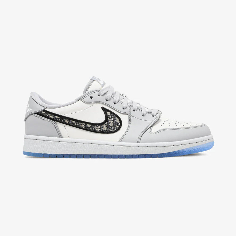 White sneaker with black swoosh logo on a white background