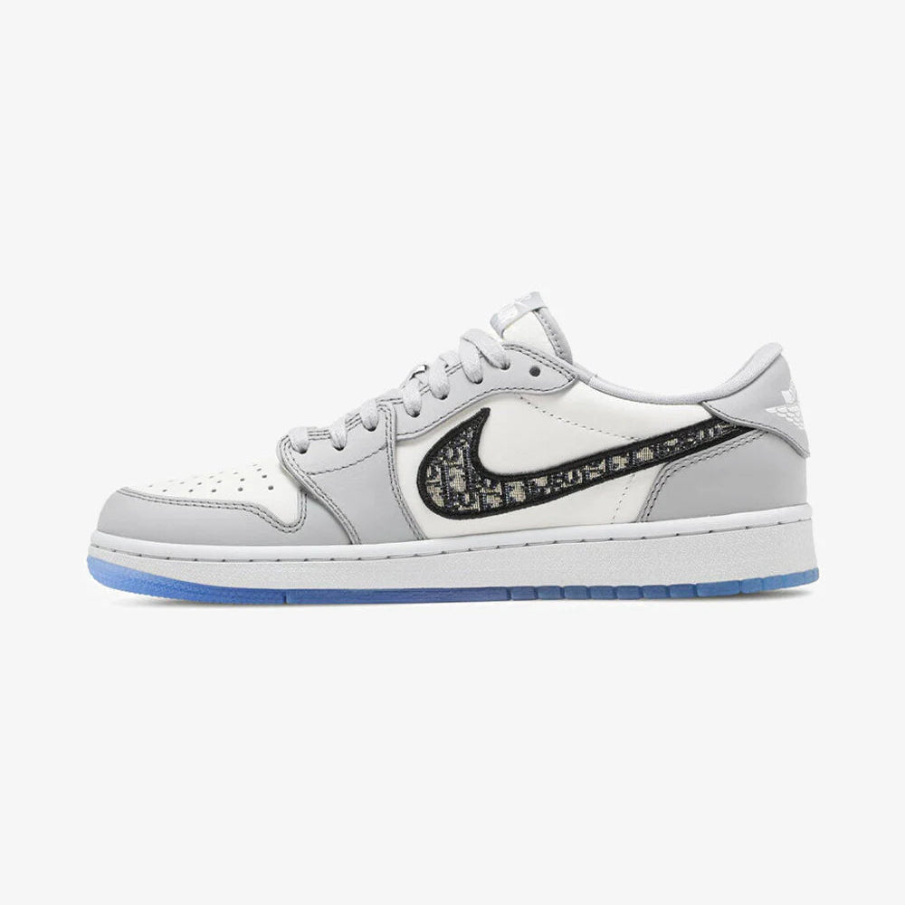 White sneaker with black swoosh logo on a white background